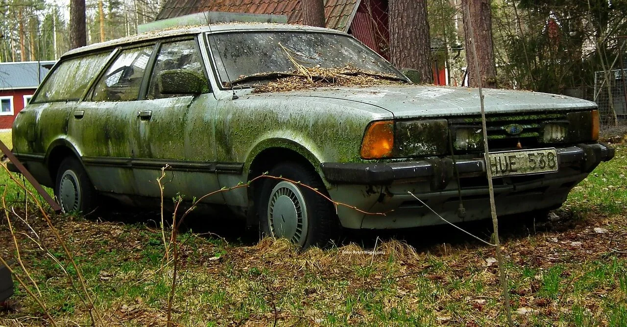 junk car in yard