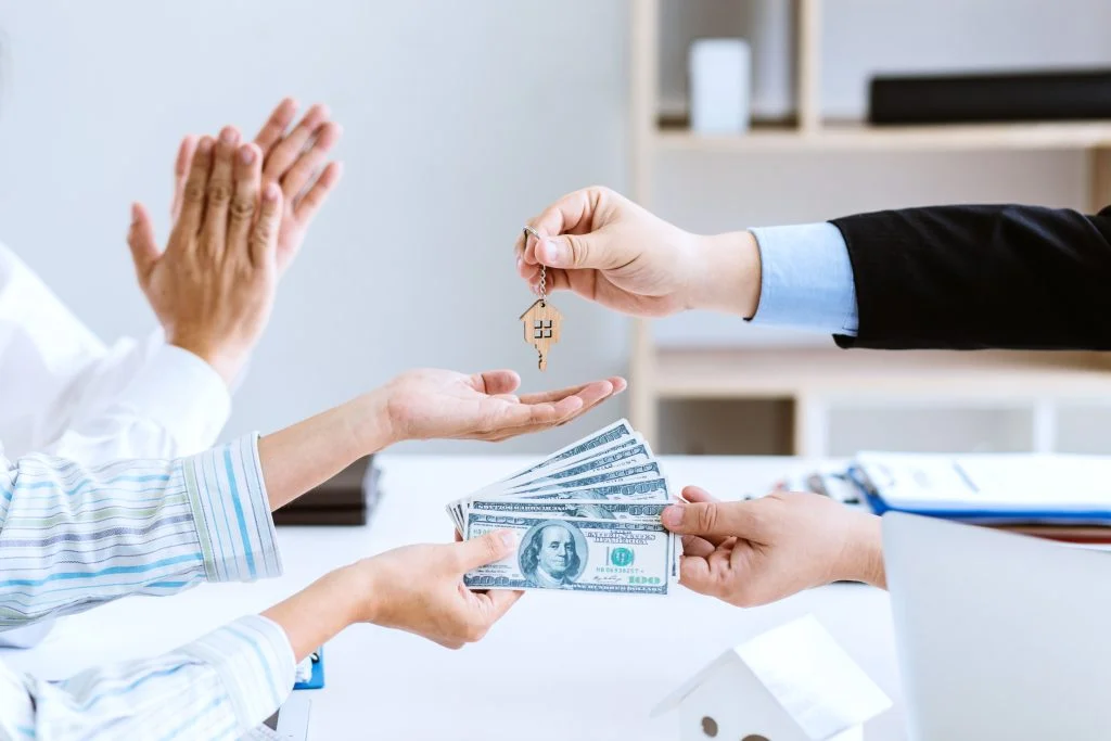 Real estate agents and clients agree to buy and sell home.